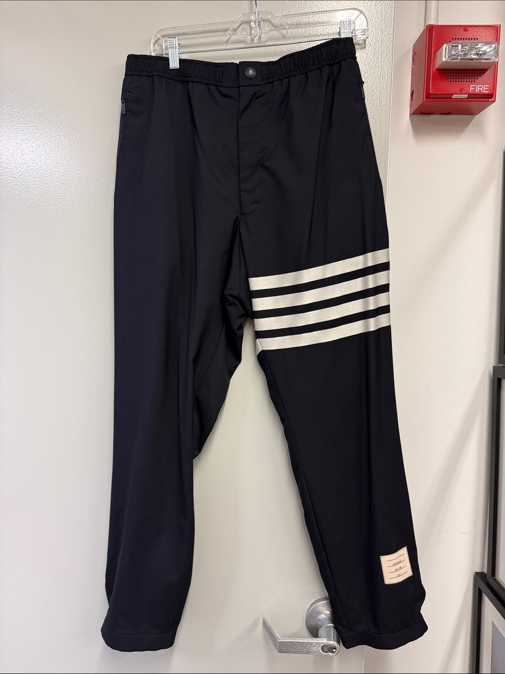 Thom Nrowne Men's navy wool upscale gym pants with iconic white Stripes